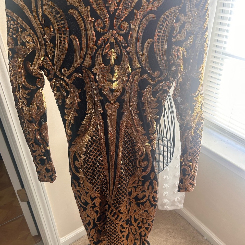 Elegant Black and Gold Embellished Dress